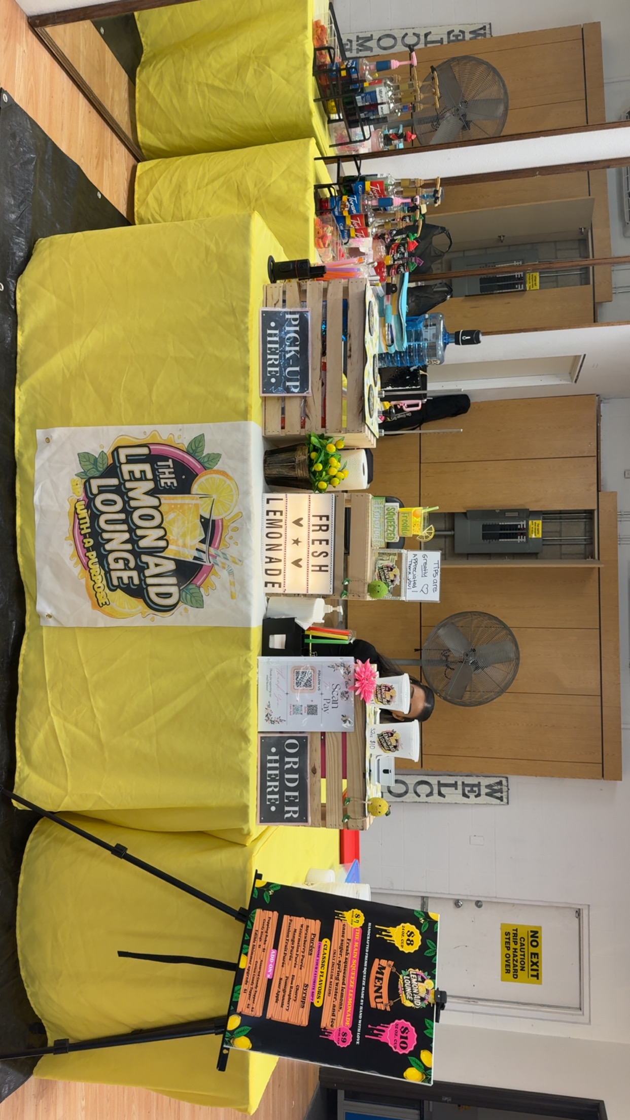 The Lemon Aid Lounge beverage station prepared for a community event