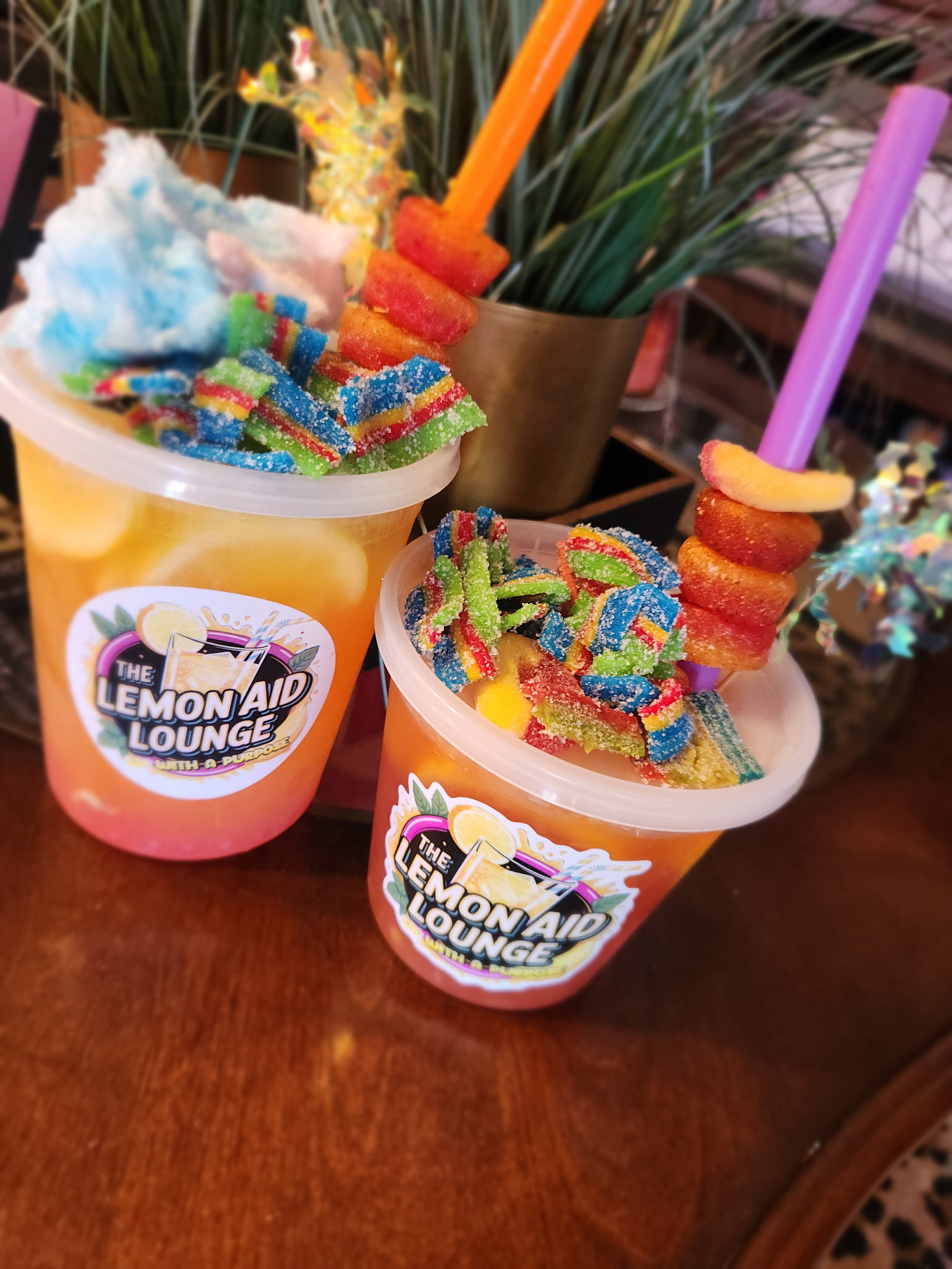 Colorful candy topped Lemon Aid Lounge lemonades